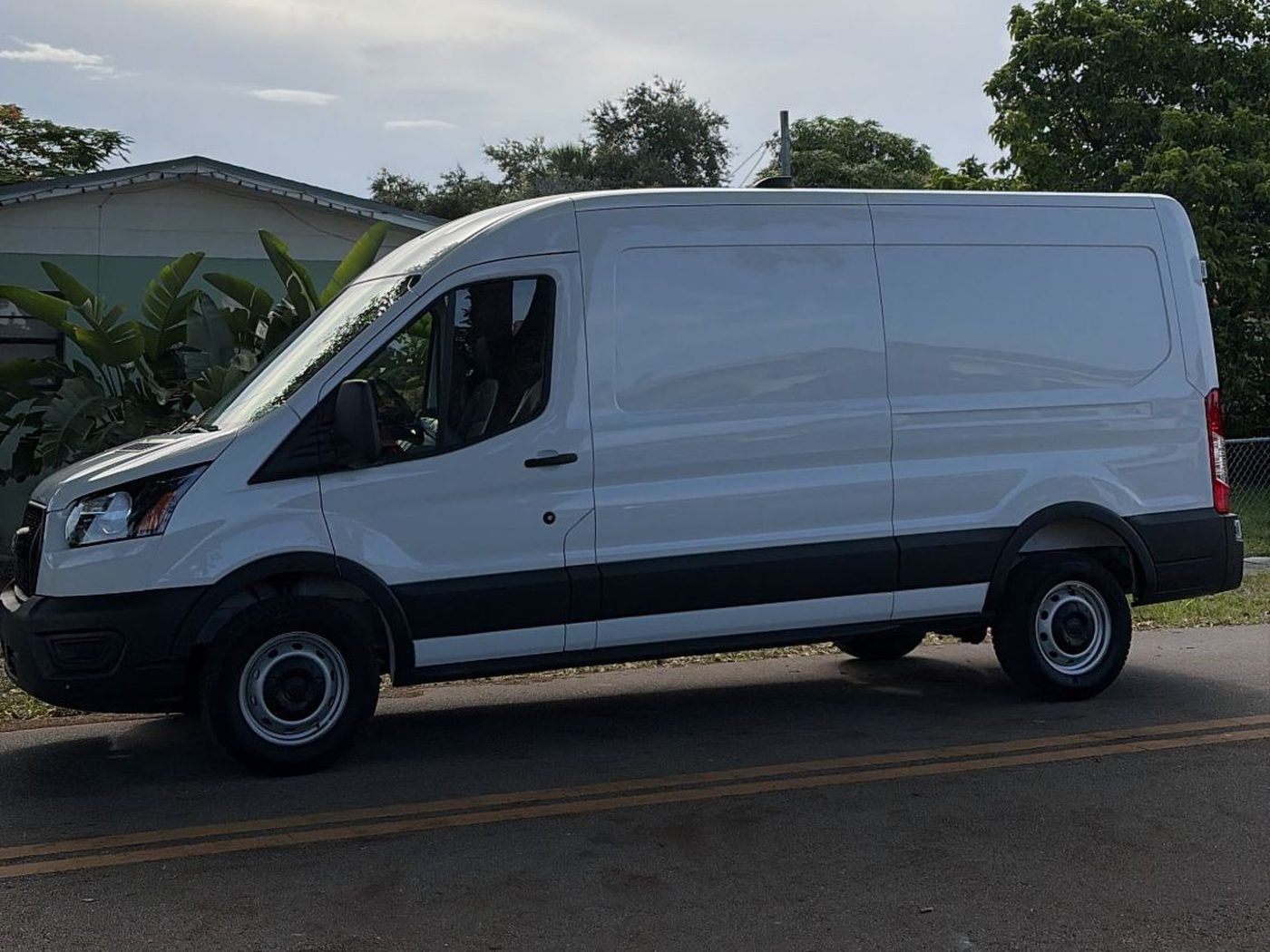 Side view of the 21 Roads Ford Transit cargo van